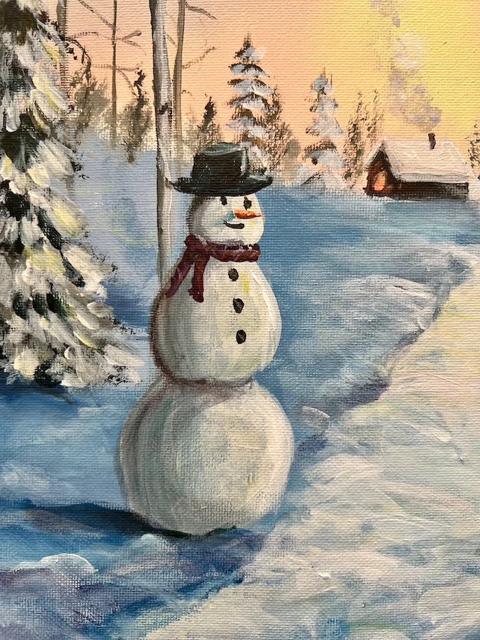 cabin and snowman in snow